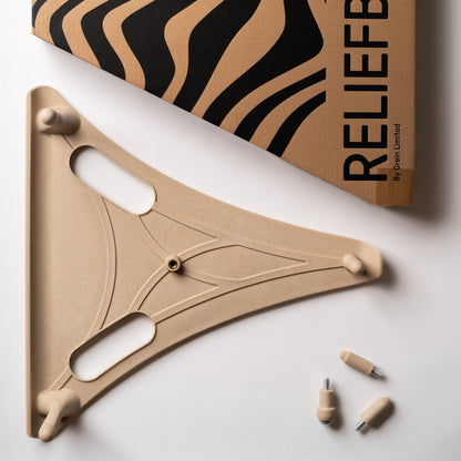 The Reliefboard shown with all its component parts, the Round peg fitted to the top attachment point. Shown on a white background with its branded box next to it.