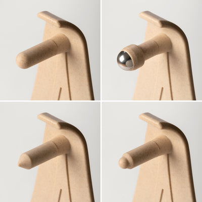 All four peg options for the Reliefboard shown in a grid: the round one, the rollerball one, the pointy one and the mini one.
